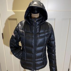 Down filled ladies black puffer size medium. Made by Spyder!